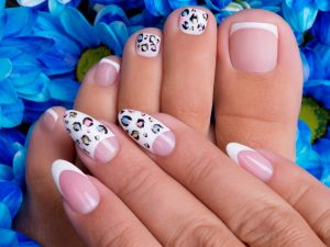 beautiful-woman-s-nails-hands-legs-with-beautiful-french-manicure-art-design (1)